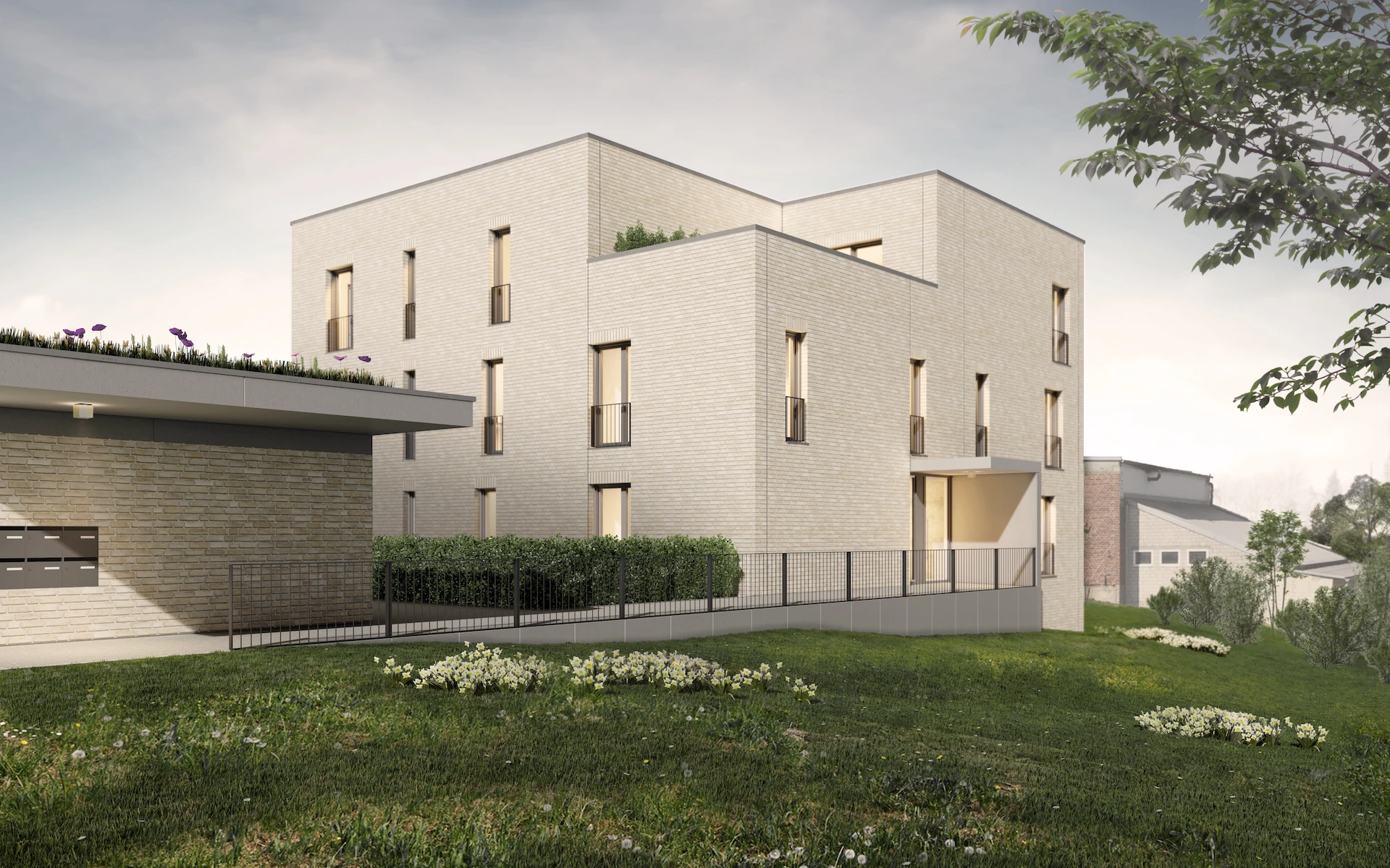 Neubau Mehrfamilienhaus in Ratingen Ansicht mit überdachten Eingang, Dachterrasse, französischen Fenstern, Sichtbetonelementen und Klinkerfassade aus Wasserstrichziegeln.