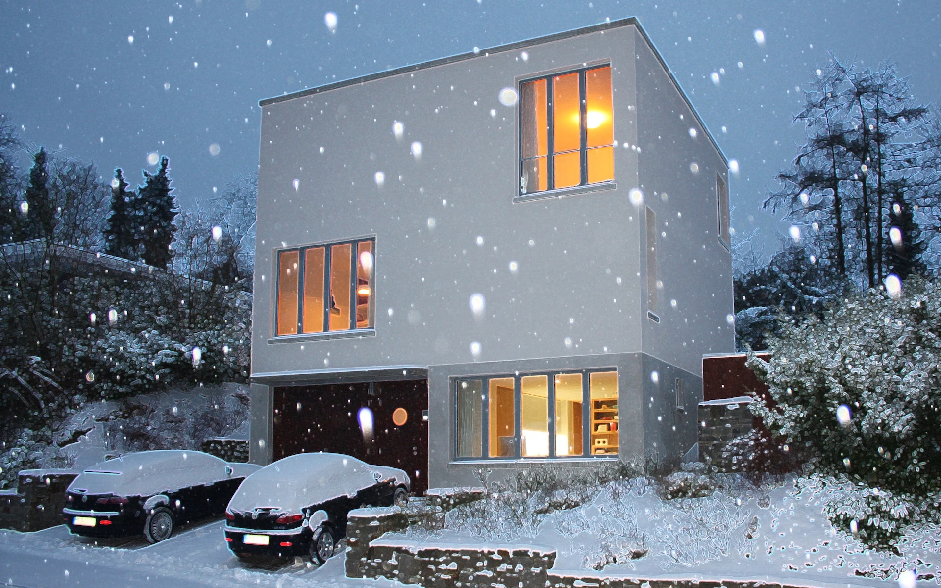 Neubau Haus R in Velbert-Langenberg Ansicht von der Straße an einem Winterabend mit Schneefall.